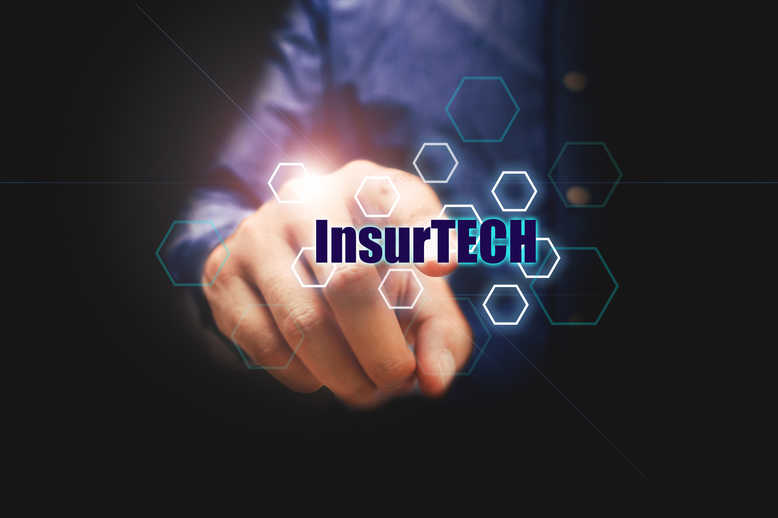 Insurtechsman pressing text with virtual screen.